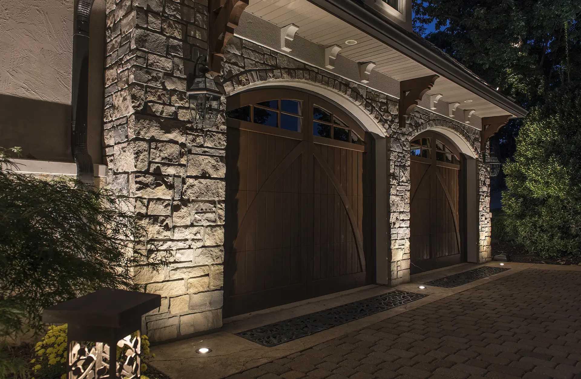 Ozarks lake house image 10 garage doors and inset lights Lighthouse Outdoor Lighting and Audio Central MO Missouri