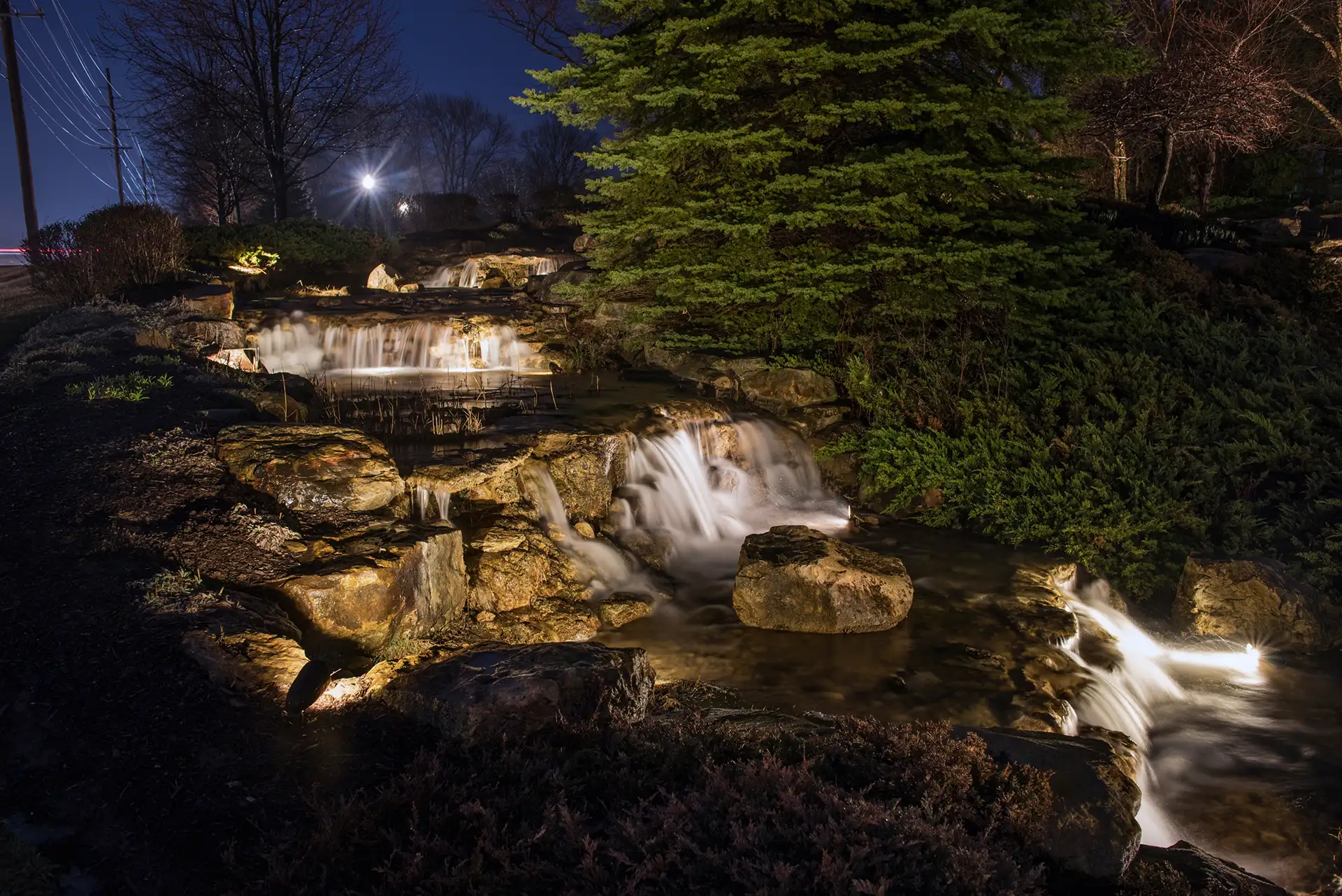 Spyglass Falls image 7 waterfall at night flowing water Lighthouse Design Studio Fishers IN
