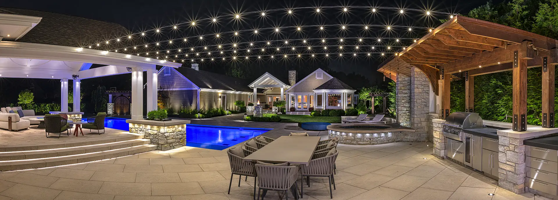 Victory Lane image 7 pool outdoor kitchen porch dining area Lighthouse Outdoor Lighting and Audio OH Columbus Cincinnati Dayton