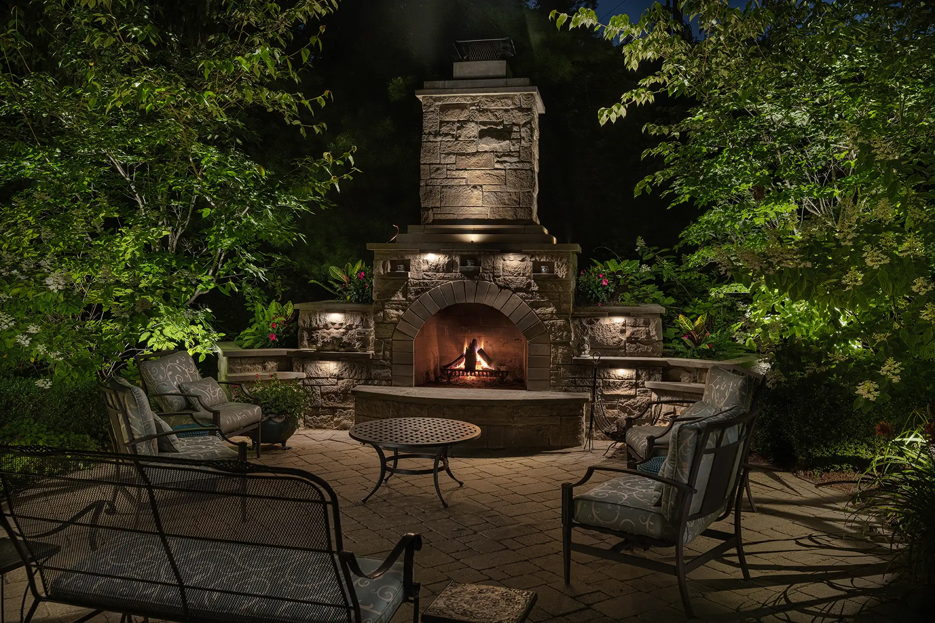 Fisher residence image 11 fireplace and seating area Lighthouse Outdoor Lighting and Audio Indianapolis IN Indiana
