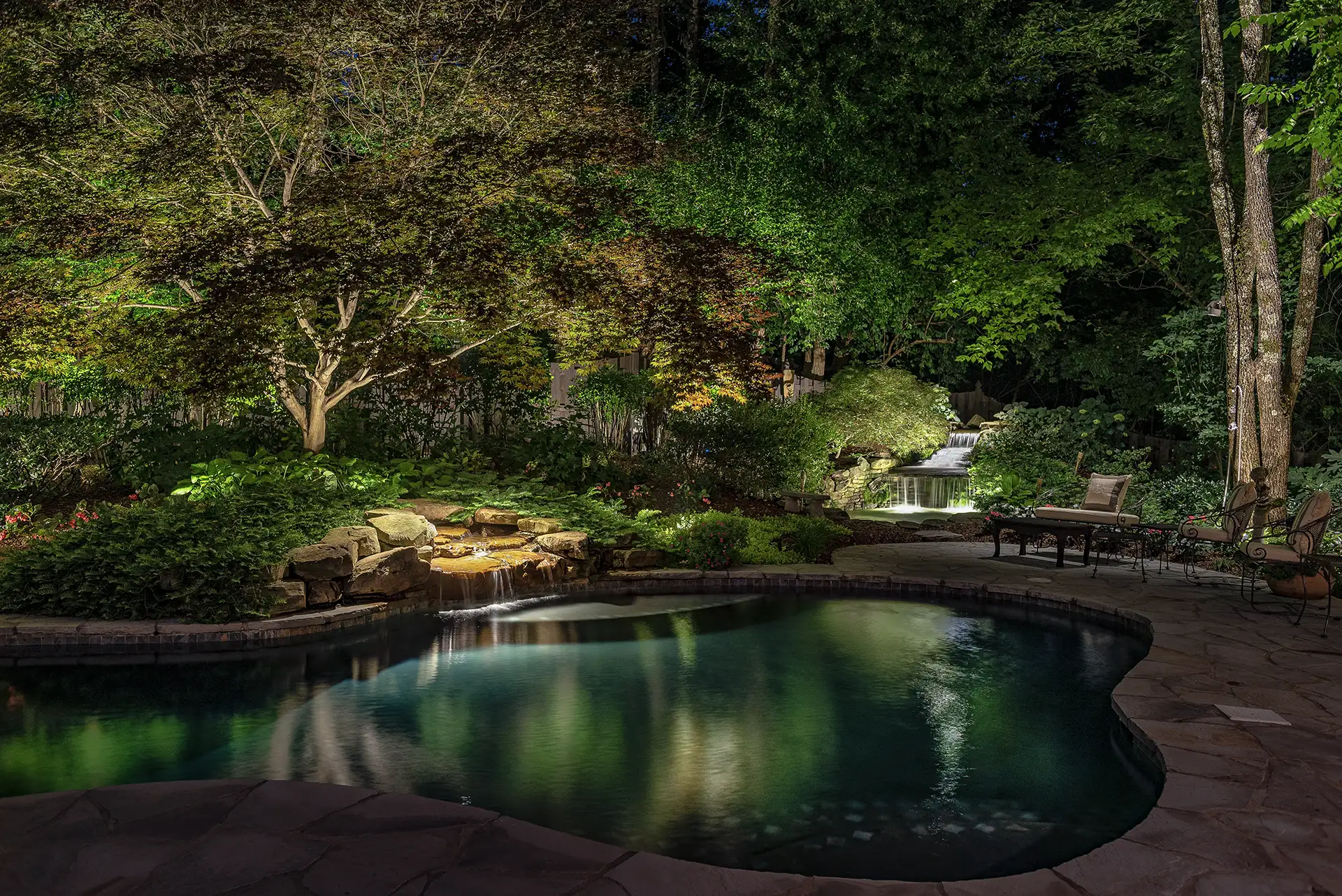 Bodell residence image 2 landscape waterfall seating area Lighthouse Outdoor Lighting and Audio Nashville TN