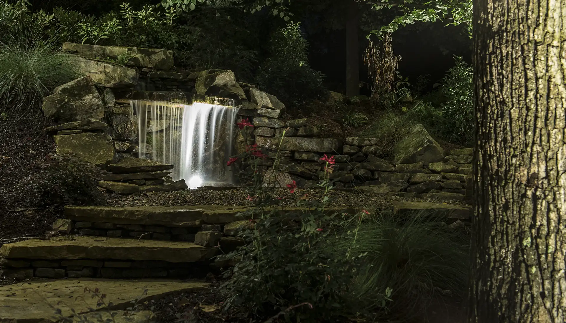 Farmer residence image 1 waterfall landscape Lighthouse Outdoor Lighting and Audio Knoxville TN
