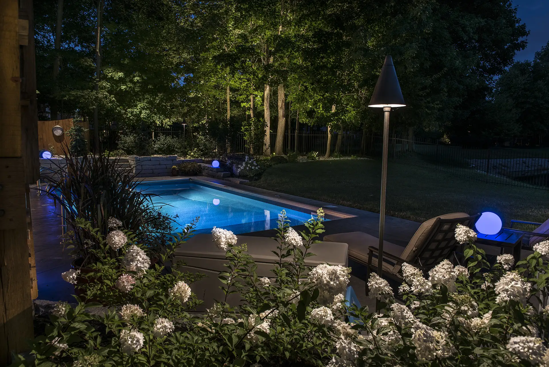 Fuson residence image 6 pool seating area flowers Lighthouse Outdoor Lighting and Audio Delaware
