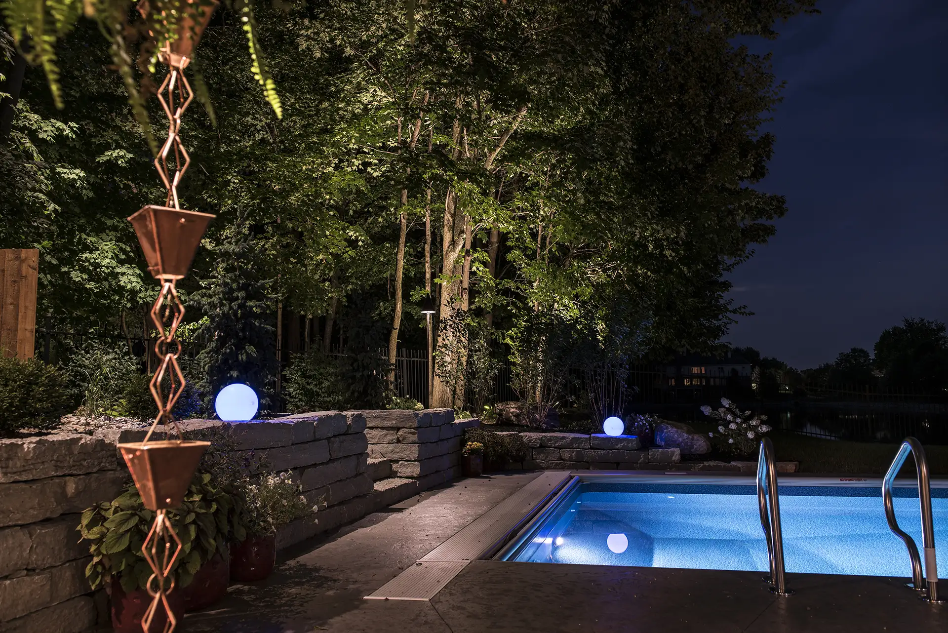 Fuson residence image 3 pool seating area wall Lighthouse Outdoor Lighting and Audio Delaware