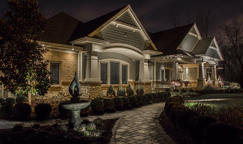 Home with Finished Landscape Lighting Design at Night