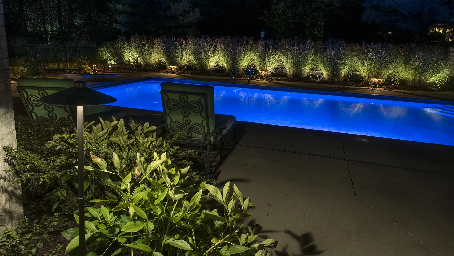 Schneider residence image 9 pool seating area Lighthouse Outdoor Lighting and Audio central Missouri