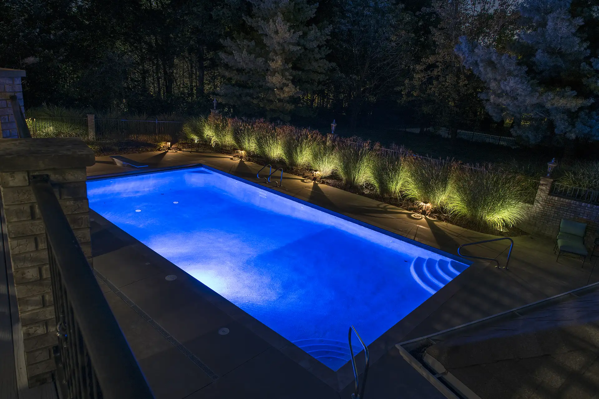Schneider residence image 4 pool seating area lighting Lighthouse Outdoor Lighting and Audio central Missouri